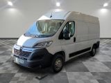 a picture of a white van parked in a room