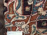 a close up of a carpet with a label on it