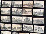 a black and white photo of a bunch of old photos