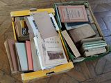 a box full of books sitting on the floor