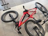 a bicycle that is laying on the floor in the room