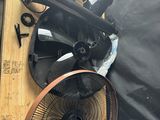 a picture of a table with a fan and other items on it