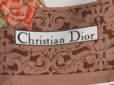 a close up of a bag with a name tag on it
