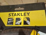 a sign that says stanley on the side of a bike tire