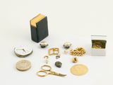 a small box with a bunch of different items on it