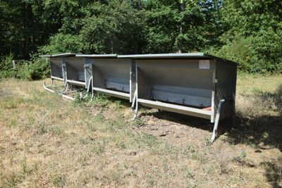 a bench that is sitting in the middle of a field