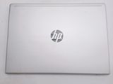a laptop that is sitting on a white table
