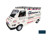 an image of a white delivery truck with stickers on the side