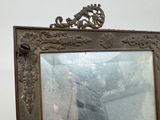 someone is taking a picture of themselves in a mirror in a room