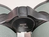 a close up of a pair of binoculars that are on a table