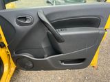 a door of a car with a speaker in it