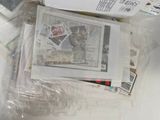 a pile of newspapers sitting on top of a table