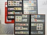 many different types of stamps on display in a room