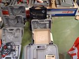 many different tools in the case on the table
