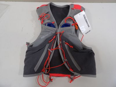 a vest that has a bottle of water in it