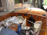 a wooden boat that is sitting in a room
