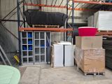a lot of boxes and boxes on the floor in a warehouse