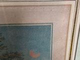 a picture of a picture of a red bird in the snow