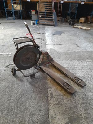 an image of a fork lifter in a warehouse