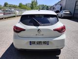 a white car parked on the side of the road