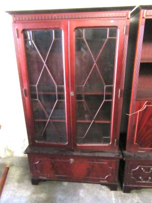 pair of antique mahogany bookcases with glass doors and drawers