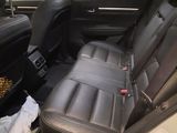 the back seat of a car with a basket in the back of it
