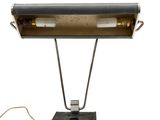 an image of a desk lamp with a cord attached to it