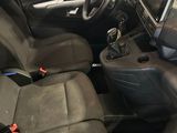 the interior of a car with black leather seats and steering controls