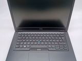 the laptop is open and ready to be used on the desk