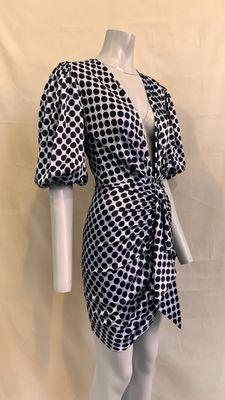 a mannequin mannequin wearing a black and white dress