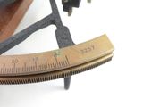 a close up of a ruler and a ruler on a table