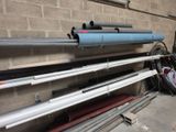 a lot of pipes that are sitting on the ground