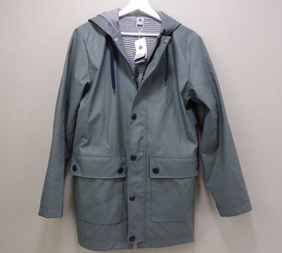the jacket is blue and has a hood that is attached to a hanger