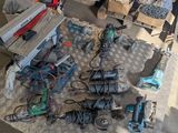 a lot of tools that are on the floor
