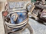 two old motorbikes that are sitting next to each other