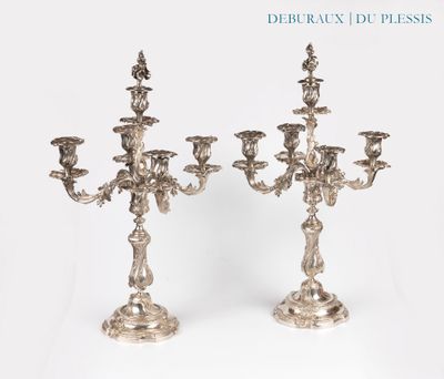 pair of antique silver plated candelabs with flowers and leaves