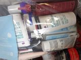 a pile of toothbrushes, toothpaste, toothpaste, toothpaste, toothpaste, toothpaste, toothpaste