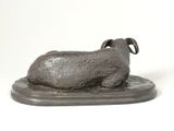 statue of a ram on a base on a white background