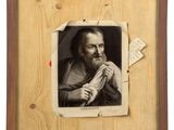 an old picture of a man with a beard holding a piece of paper