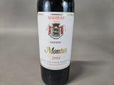 a bottle of wine that is sitting on a table