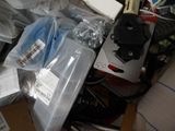 a pile of electronics that is sitting on the floor