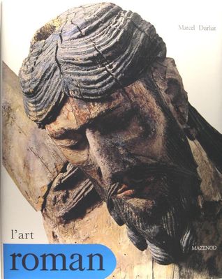 une image montrant un gros plan d'une statue représentant un homme sur une croix