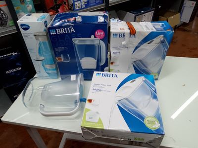 a lot of items on the table in the store