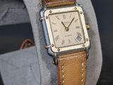 an image of a close up of a wrist watch with a leather band