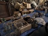 a blue table with a bunch of items on it