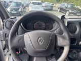 dashboard of a car with a steering wheel and dashboard controls