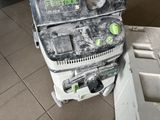 a small machine that is sitting on a tiled floor