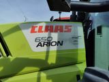 a close up of a green tractor with a sticker on it ' s side