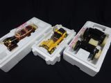 three plastic containers with toy cars in them on a black background