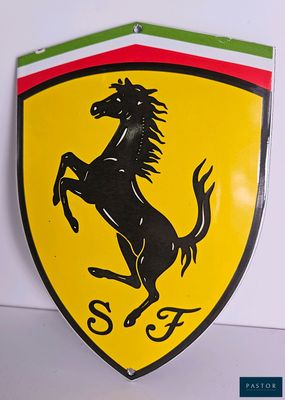 ferrari logo on a yellow shield with a black horse on it